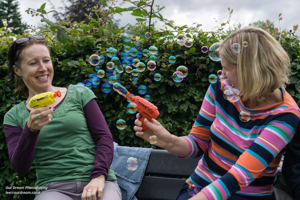 Bubbles reflecting the colours of the clothes. 